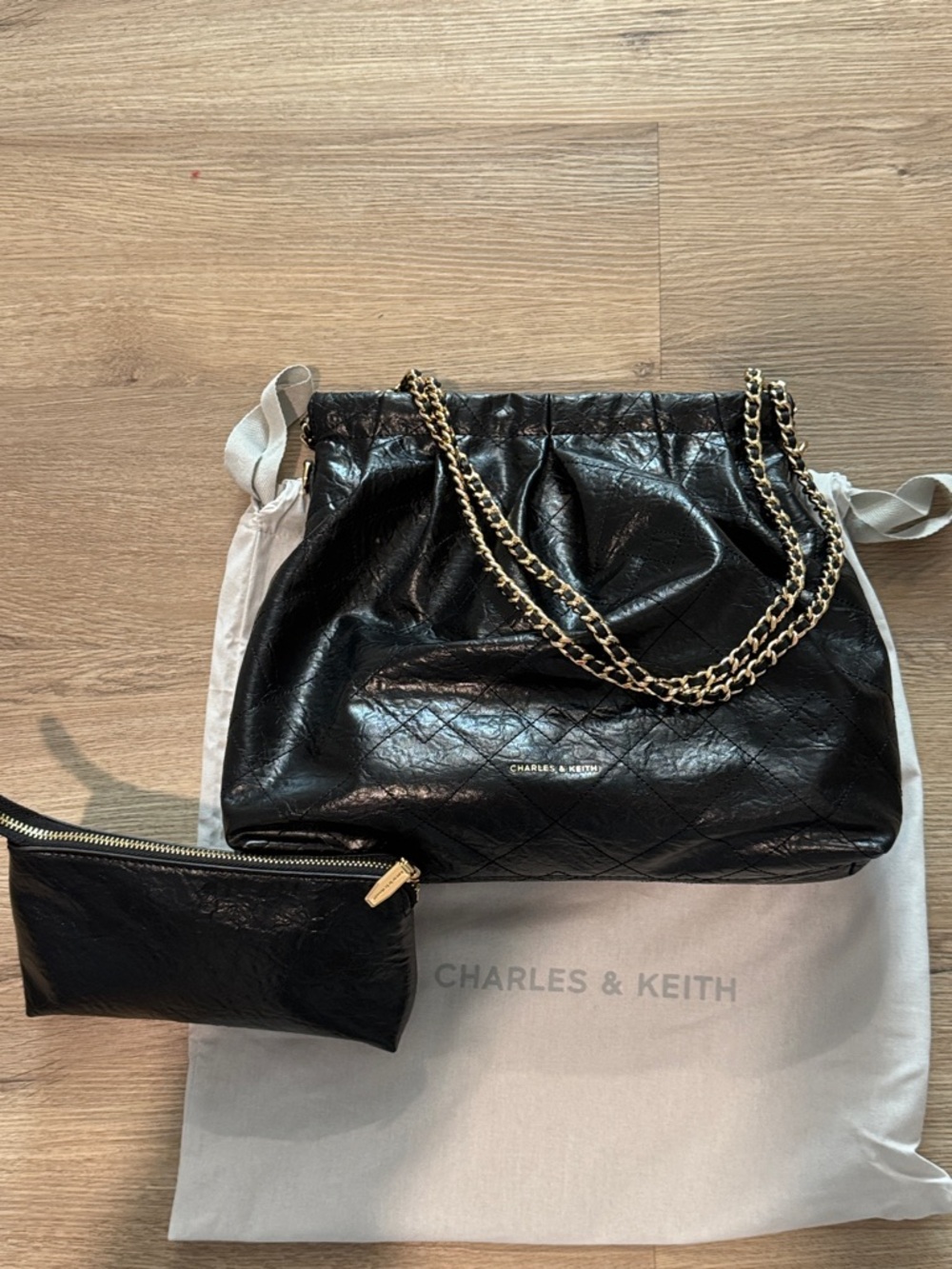 Charles & Keith Black Quilted Shoulder Bag with Gold Chain